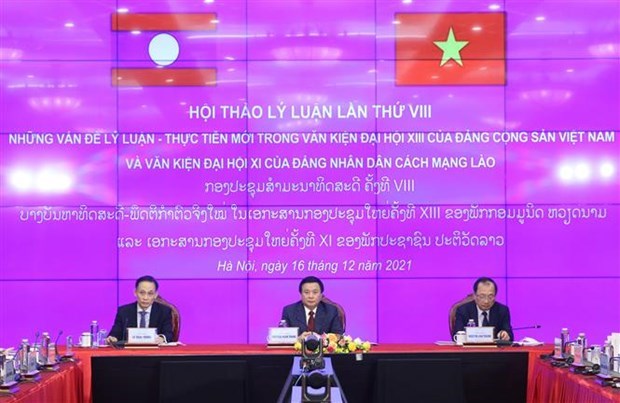 Vietnamese, Lao Parties hold eighth theoretical workshop via videoconference hinh anh 1