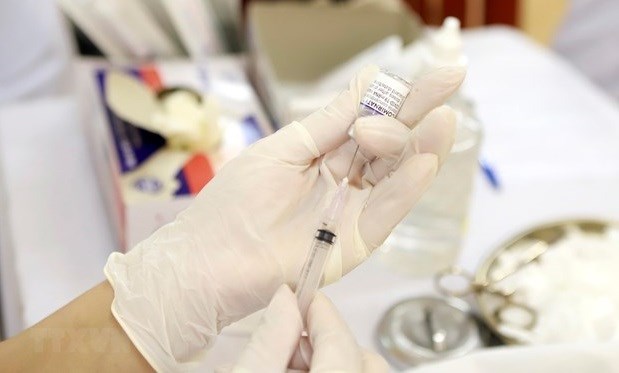 PM requires survey on COVID-19 vaccinations for children aged from five hinh anh 1