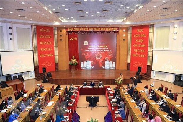 Forum discusses COVID-19 vaccine race's impacts hinh anh 1