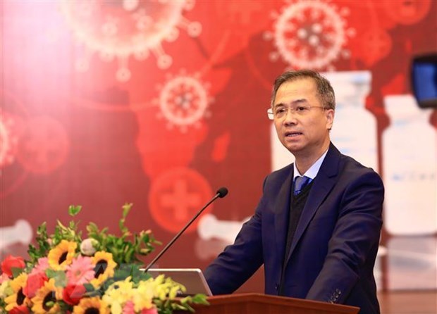 Forum discusses COVID-19 vaccine race's impacts hinh anh 2