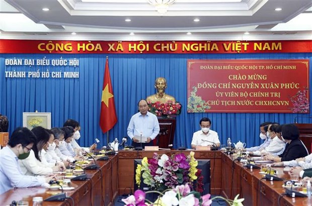 President Nguyen Xuan Phuc meets HCM City’s NA deputies hinh anh 1