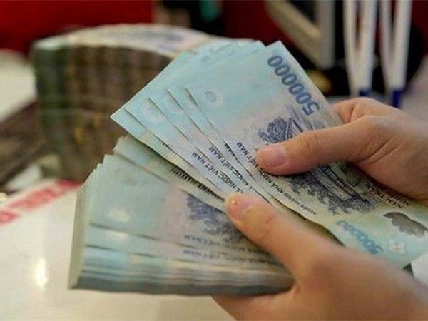 Reference exchange rate down 15 VND at week's beginning hinh anh 1