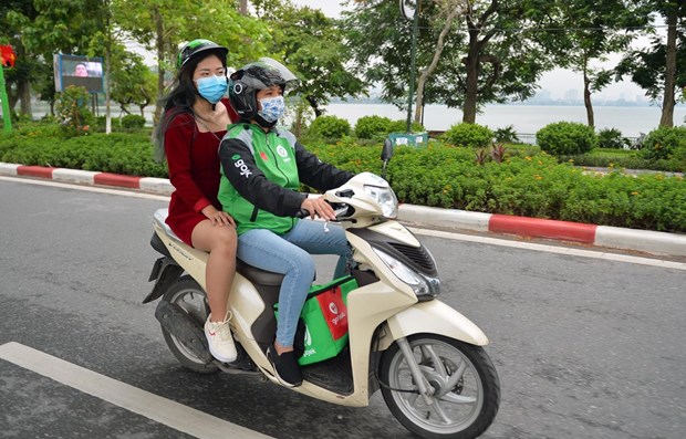 Motorbike taxi services returns in Hanoi hinh anh 1