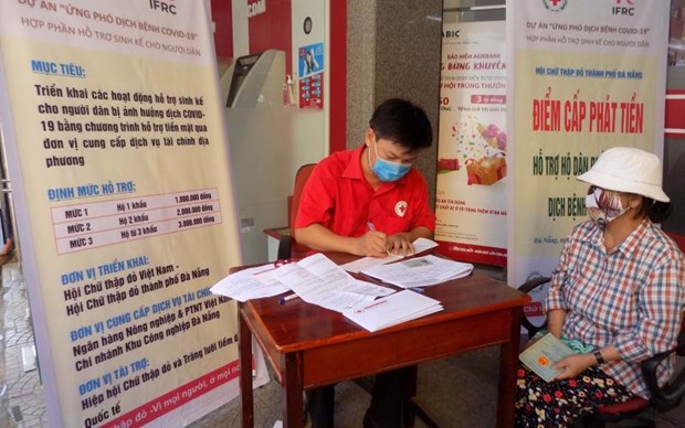COVID-19 support packages benefit over 5.57 million people in Hanoi hinh anh 1
