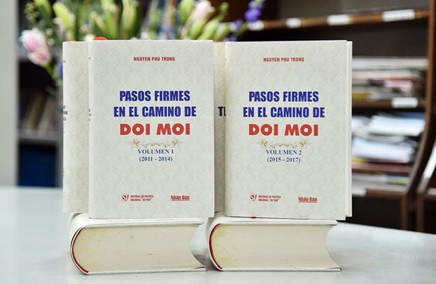 Libro del líder del partido sobre el camino de Doi moi publicado en idioma español hinh anh 1