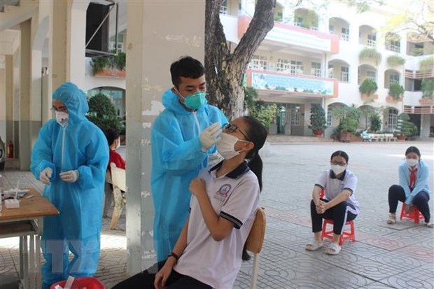 COVID-19: New cases on Feb 14 surge to over 29,000 hinh anh 1