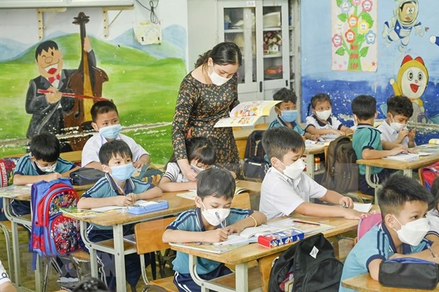 HCM City: Kindergarten, primary school students back to school hinh anh 1
