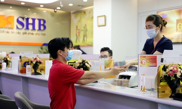 Lenders hope for big earnings in 2022 hinh anh 1