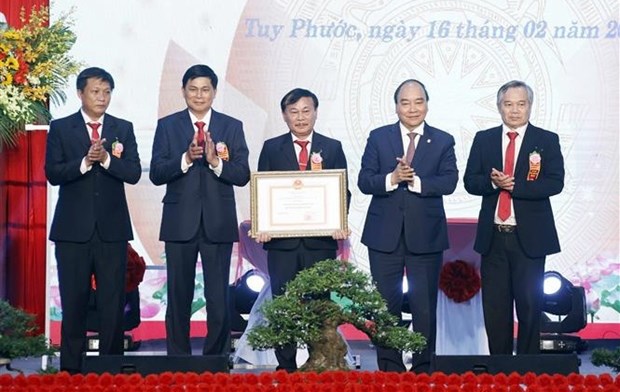President attends ceremony recognising Binh Dinh’s Tuy Phuoc as new-style rural district hinh anh 1