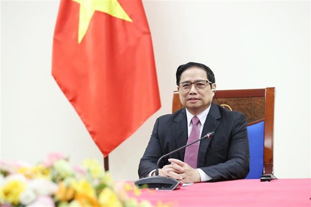 Prime Minister holds phone talks with COVAX Managing Director hinh anh 1