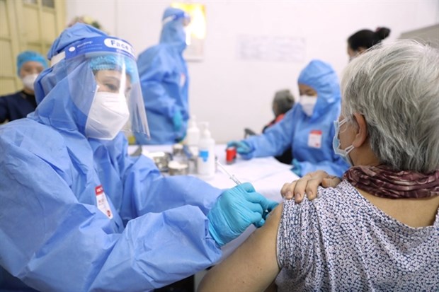 Vietnam hits milestone of 200 million COVID-19 vaccine doses administered hinh anh 1