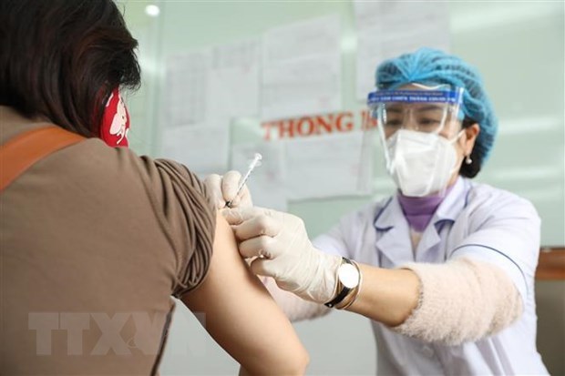 COVID-19: new cases drop by over 89,300 on March 15 hinh anh 1