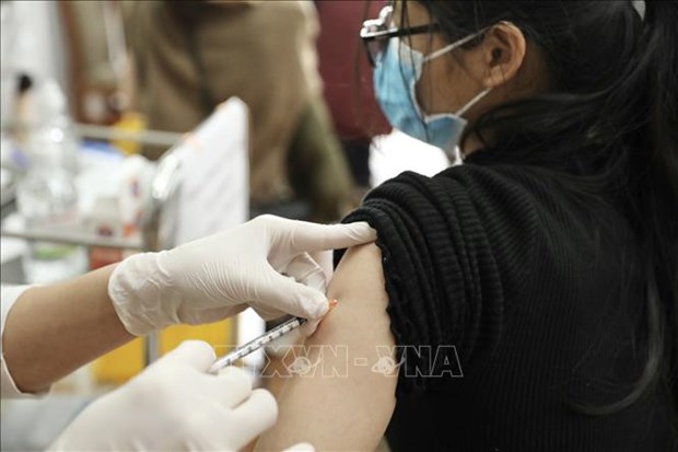 Vietnam records 163,174 new COVID-19 infections on March 18 hinh anh 1