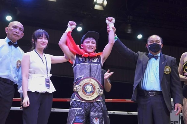 Vietnamese boxer secures WBA Asia title hinh anh 1