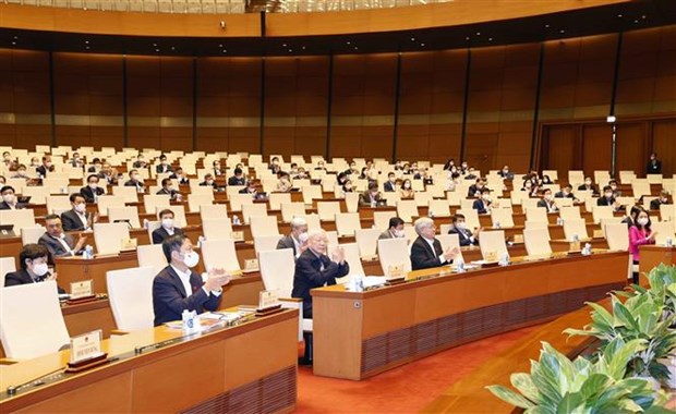 Full-time legislators convene meeting to talk draft laws hinh anh 2