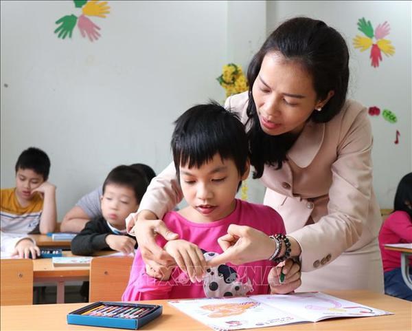 Communication activities aim to raise public awareness of children with autism hinh anh 1