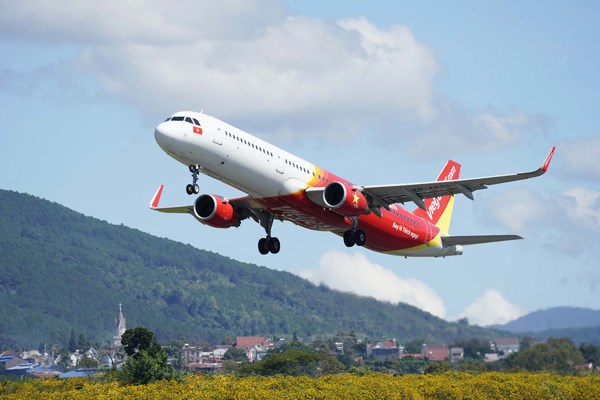 Vietjet reports profit in 2021 despite impacts from COVID-19 hinh anh 1