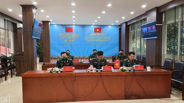 Vietnamese, Chinese border forces step up cooperation in law enforcement hinh anh 1