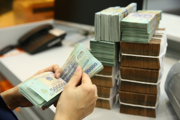 Reference exchange rate down 3 VND at week’s beginning hinh anh 1