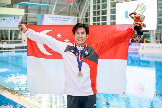 SEA Games 31: 17-year-old boy bags first medal for Singapore in springboard event hinh anh 1