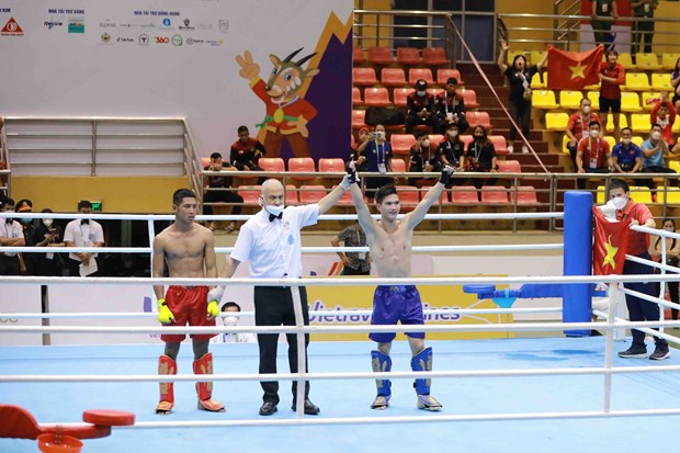 SEA Games 31: Two Vietnamese kickboxers advance to semi-finals hinh anh 1