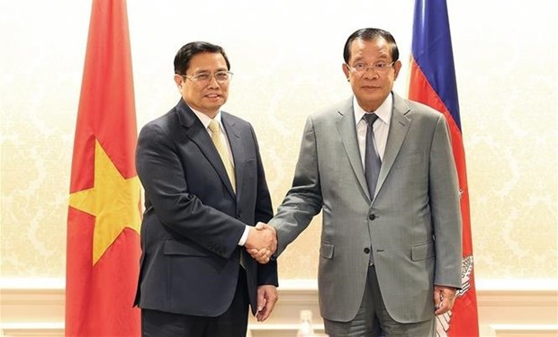 PM meets with Cambodian counterpart in US hinh anh 1