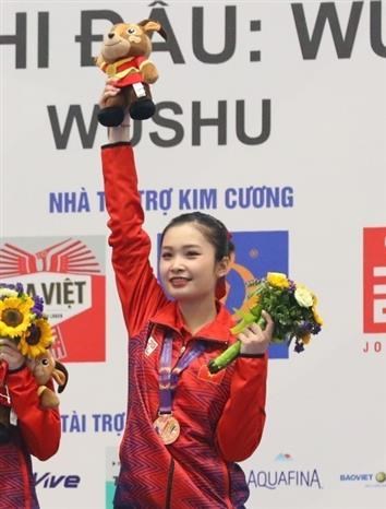 SEA Games 31: Vietnamese wushu athletes pocket 8 medals after two days of competition hinh anh 1