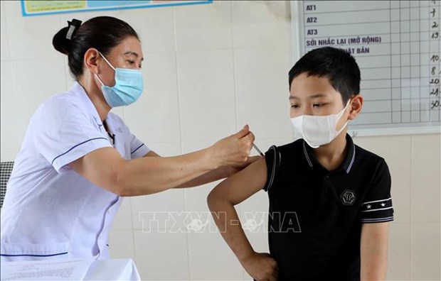Vietnam documents 1,594 COVID-19 cases on May 15 hinh anh 1
