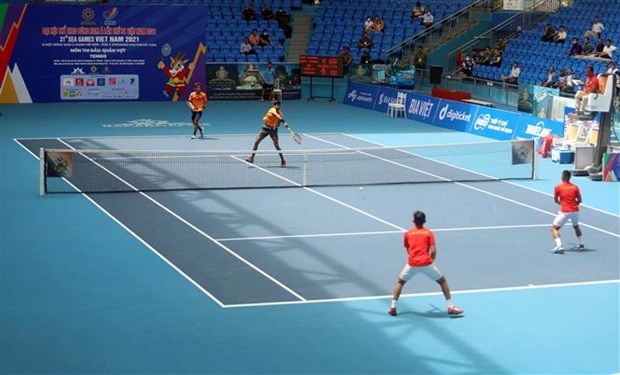 SEA Games 31: Vietnam trounce Malaysia in men’s doubles tennis qualifications hinh anh 1