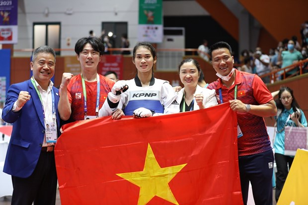 SEA Games 31: Vietnam exceeds gold medal target in taekwondo hinh anh 1