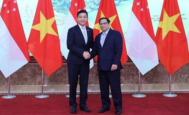 PM Pham Minh Chinh welcomes Speaker of Singaporean Parliament hinh anh 1