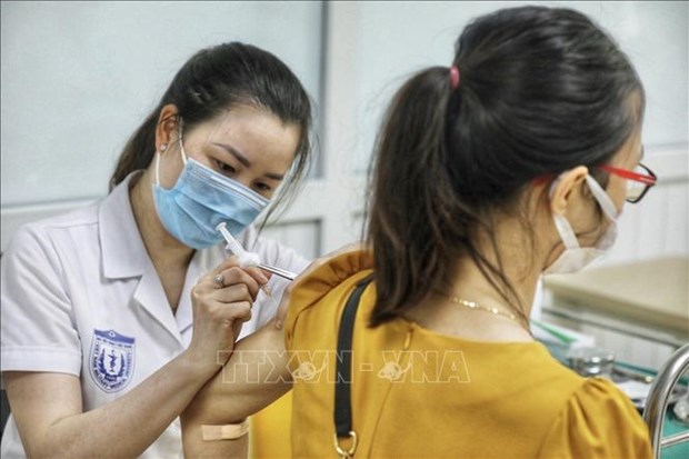COVID-19: New cases total 1,323 on May 24 hinh anh 1