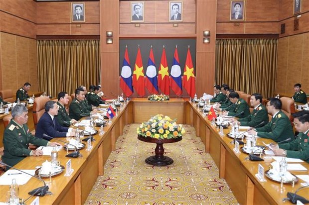 Vietnamese, Lao defence ministries foster all-round cooperation hinh anh 2
