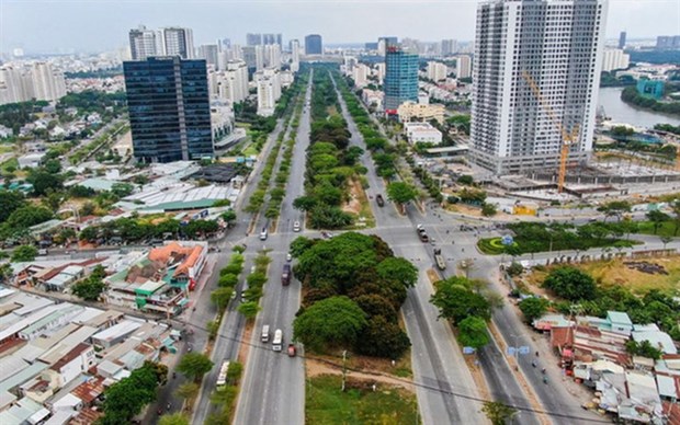 Four outlying HCM City districts to be upgraded into cities hinh anh 1