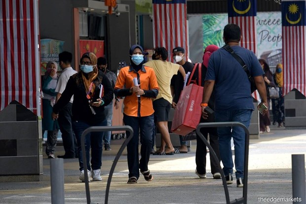 Malaysia’s unemployment rate dips to below 4 percent hinh anh 1
