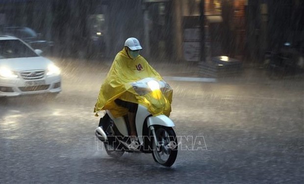 Northern, central regions enter prolonged rainy spell hinh anh 1