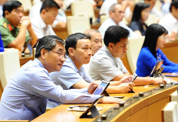 Lawmakers adopt several laws, resolutions on June 14 hinh anh 1