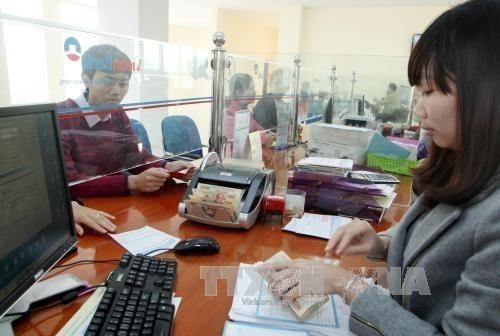 Reference exchange rate down 4 VND on June 17 hinh anh 1