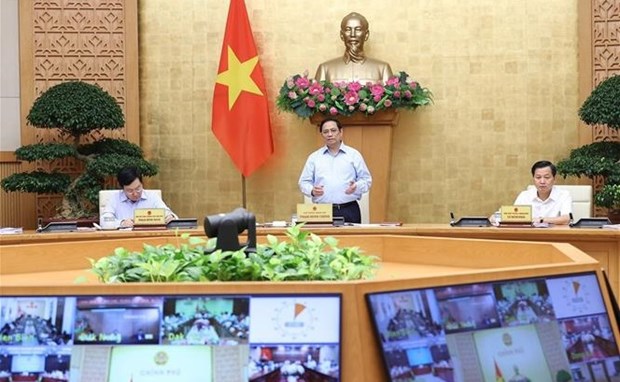 Cabinet meeting looks into socio-economic situation hinh anh 1