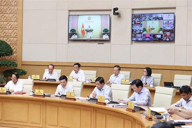 Cabinet meeting looks into socio-economic situation hinh anh 2
