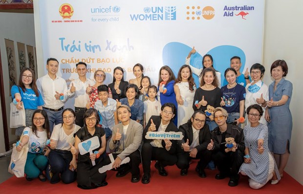 Campaign spreads message of zero tolerance for violence against children, women hinh anh 1