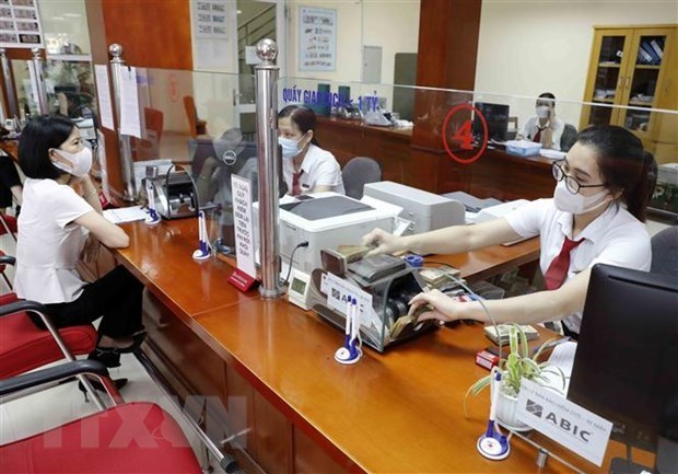 Reference exchange rate up 13 VND on July 12 hinh anh 1