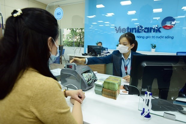 Reference exchange rate up 20 VND at week’s beginning hinh anh 1