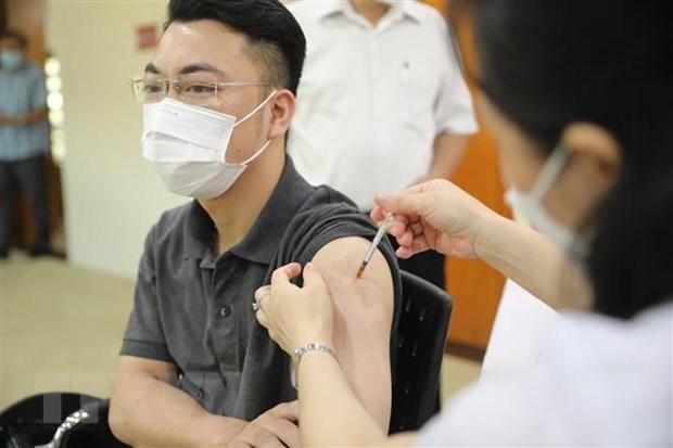 Vietnam records 1,162 new COVID-19 cases on July 20 hinh anh 1
