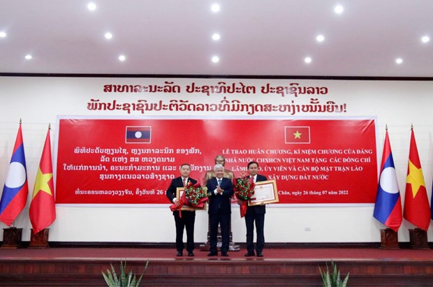 Vietnamese, Lao Fronts foster cooperation hinh anh 2