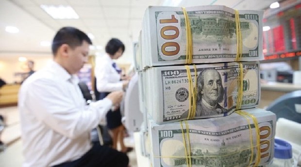 Remittances to HCM City drop 13% in H1 hinh anh 1