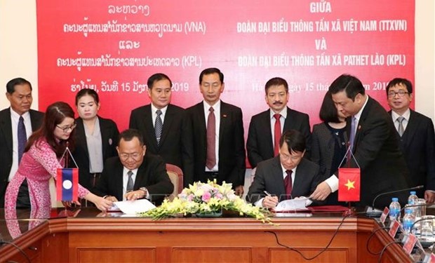 Heartfelt relations between news agencies of Vietnam, Laos hinh anh 1