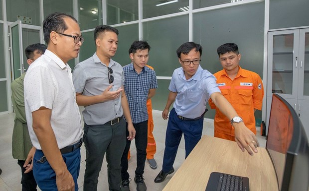 Vietnamese, Lao experts share experience in hydropower plant operation hinh anh 1