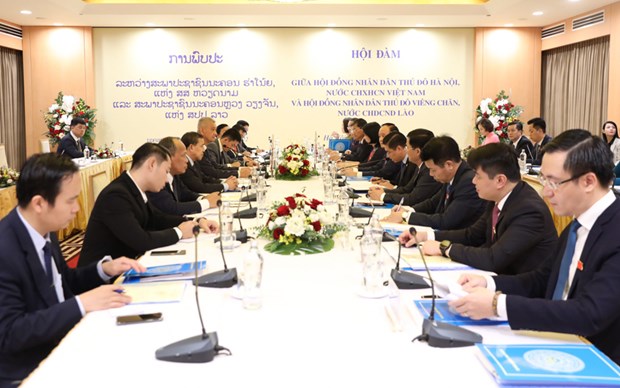 Hanoi, Vientiane share working experience of people-elected agencies hinh anh 1