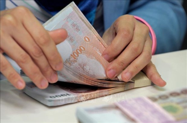 Thai baht surges on prospect of tourism recovery hinh anh 1